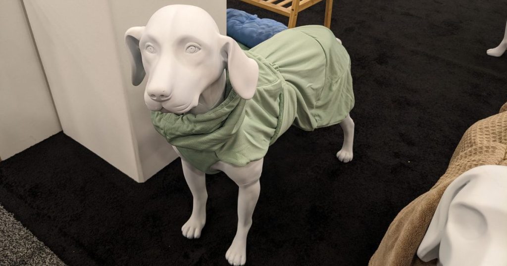 PAIKKA Drying Coat 2Go on dog figurine | 12 Coolest Pet-Friendly Outdoor Travel Products We Found at SuperZoo